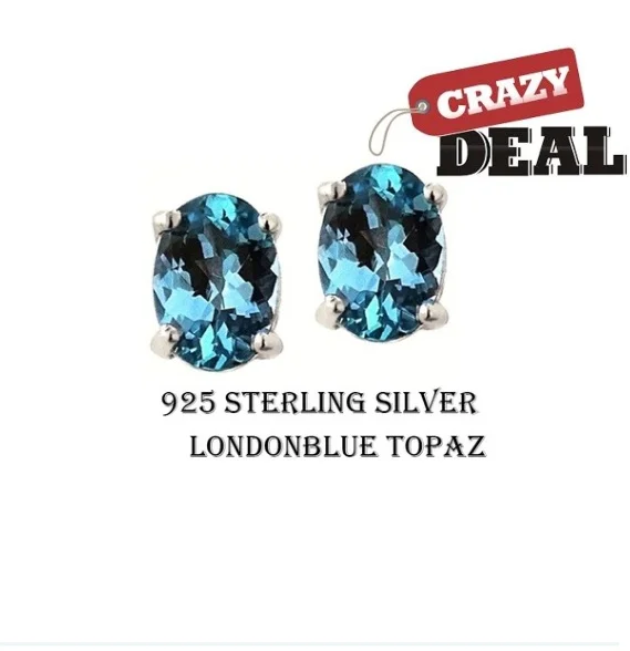 

2.00 CTTW .Genuine Oval 7x5 London Blue Topaz Stud Earrings