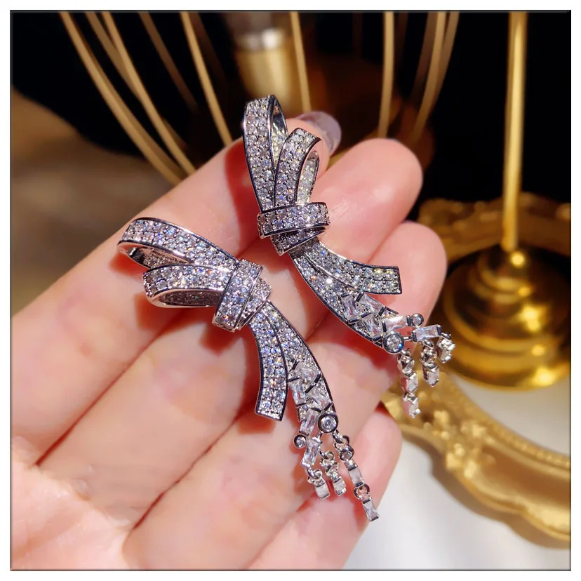 

Exquisite and Lovely Silver Glitter Zircon Gemstone Bow Long Tassel Earrings Female Fashion Jewelry Korean Style Earrings