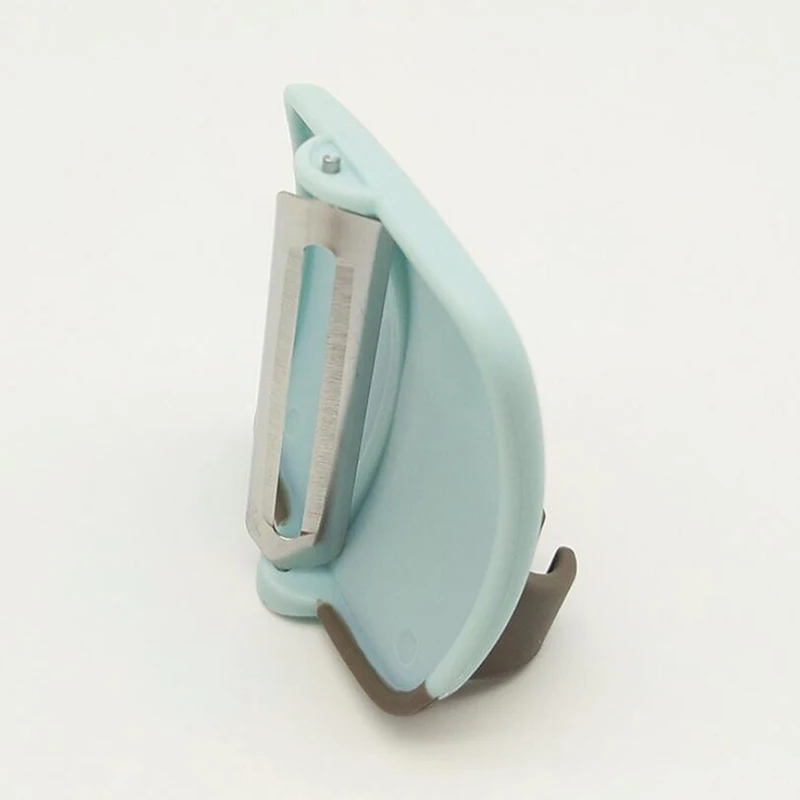 Новые творческие палец провел ладони очистки фруктов и овощей легко держать