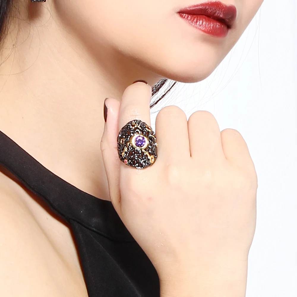 Женские вечерние кольца большие черные широкие с фиолетовыми и красными