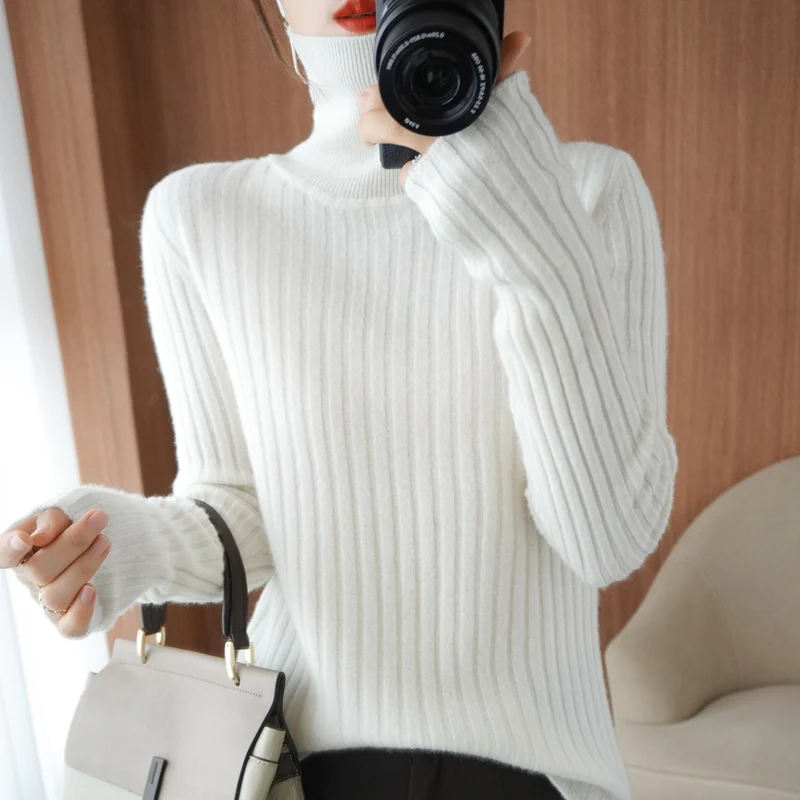 

Pure color pit strip high-neck pure wool sweater women's autumn and winter 2021 new loose padded cashmere sweater