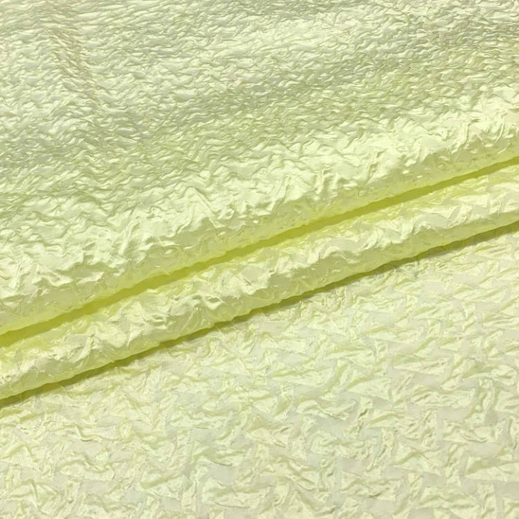 

Spring thin three-dimensional jacquard fabric yellow bubble color weaving jacquard dress fabric embossed goose woven briquette