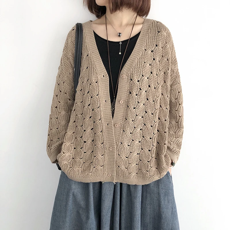 

Knitted cardigan women's spring and autumn loose large size thin section with a hollow long-sleeved top literary sweater jacket