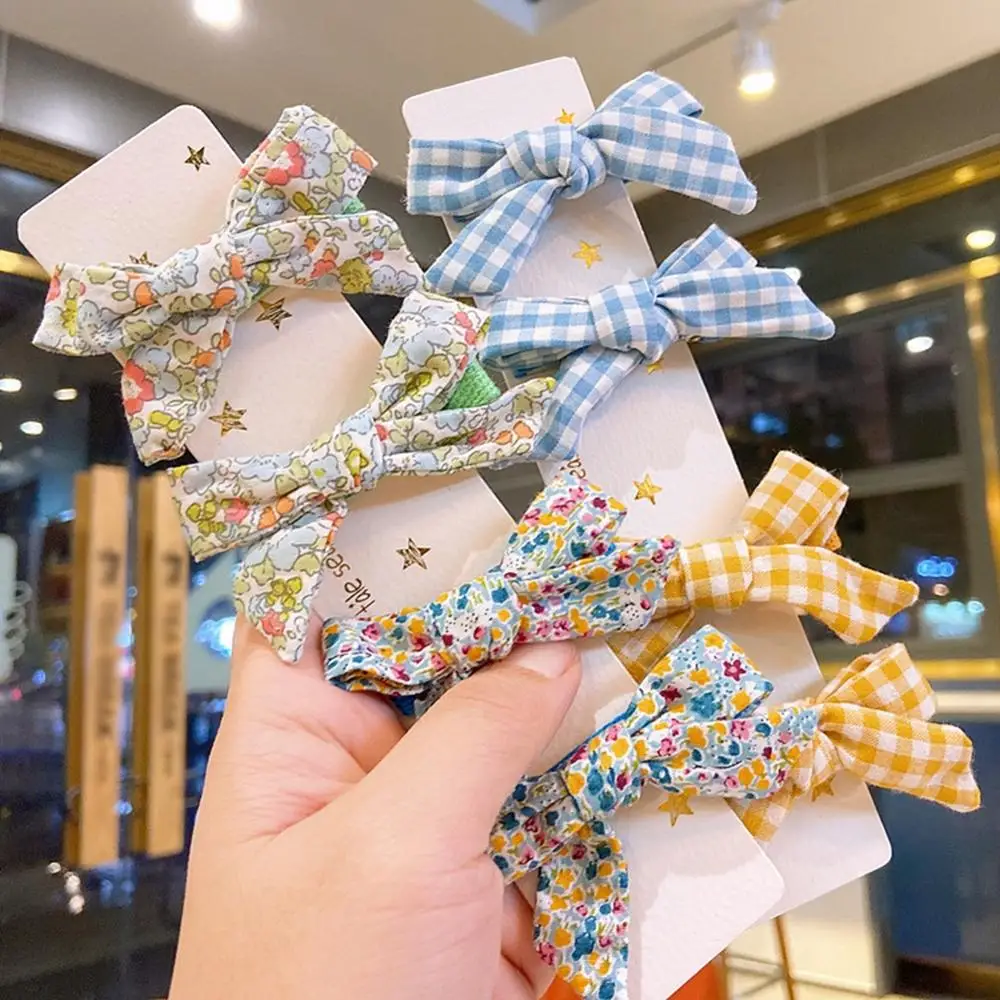 

4 Pcs Girls Cute Print Bow Hairpin Set