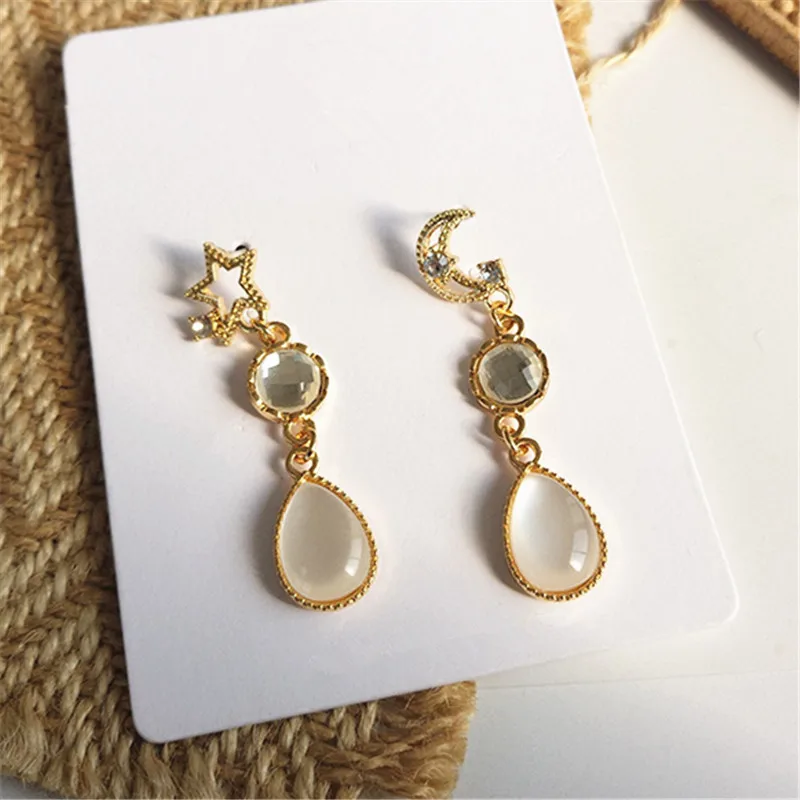 

Fashion simple crystal tassel earrings female stars moon classic resin earrings woman jewelry Classic long earrings for women