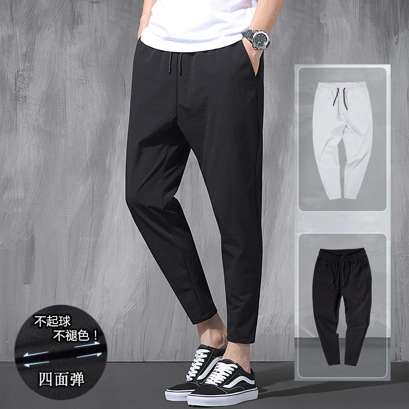 2023 New Korean Ice Silk Elastic Trousers Four Seasons Thin Casual Men'S Loose 9-Point Large Size Small Foot Sports Pants Spring