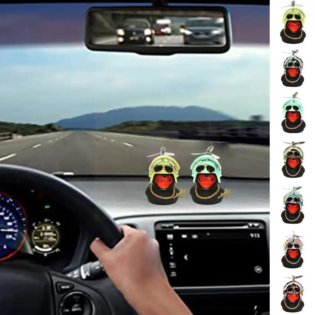 

Automotive Interior Yellow Duck With A Motor Bike Helmet Light Auto Without Parts I3A0