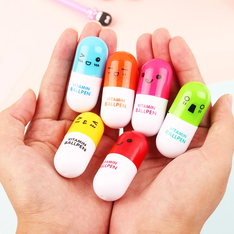 

12 pcs/Lot Vitamin ballpen Novelty Capsule ballpoint pens Blue color ink material school Office supplies Patty stationery F205