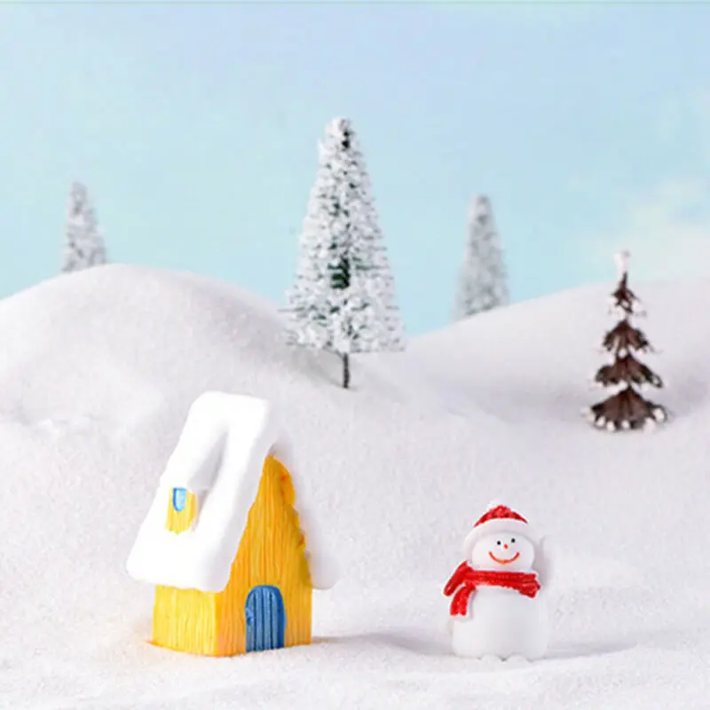 Рождественские украшения для дома крыши которого покрыты снегом подарок | Дом и