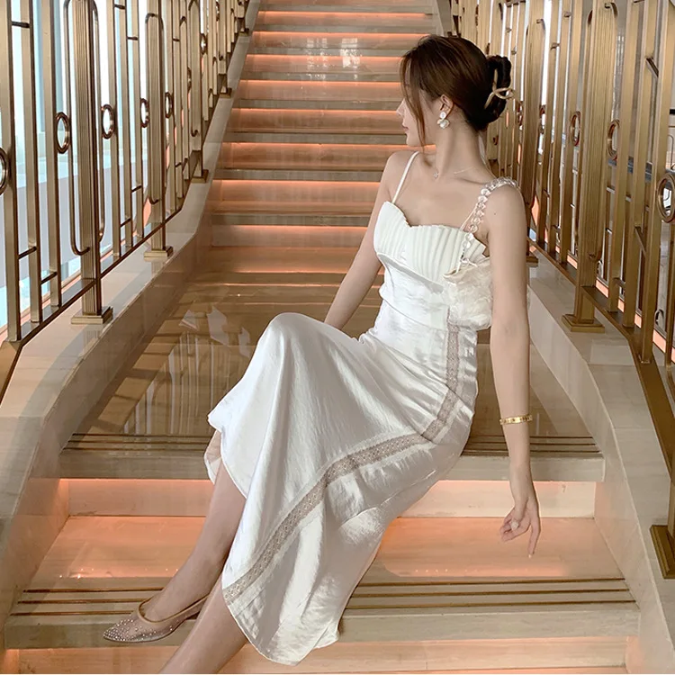 

French minority white shell suspender skirt Pearl Satin Lace stitching slim seaside holiday dress