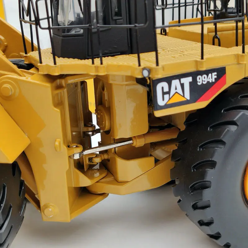 Суперколесный погрузчик Norscot 1/50 CAT 994F 55161 литые модели ограниченная серия| |