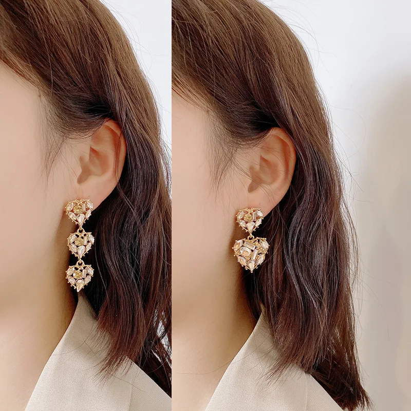 

South Korea advanced sense temperament web celebrity all-match water diamond asymmetrical love S925 silver needle female earring