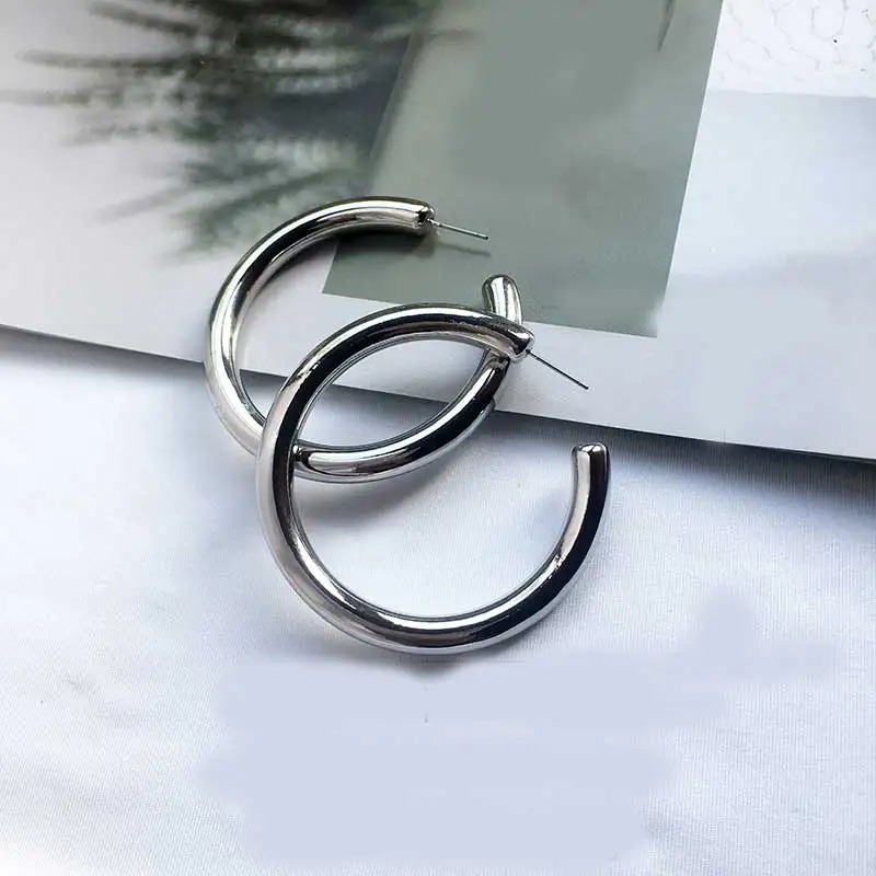 Модные массивные золотые серебряные серьги маленькие большие женские в стиле