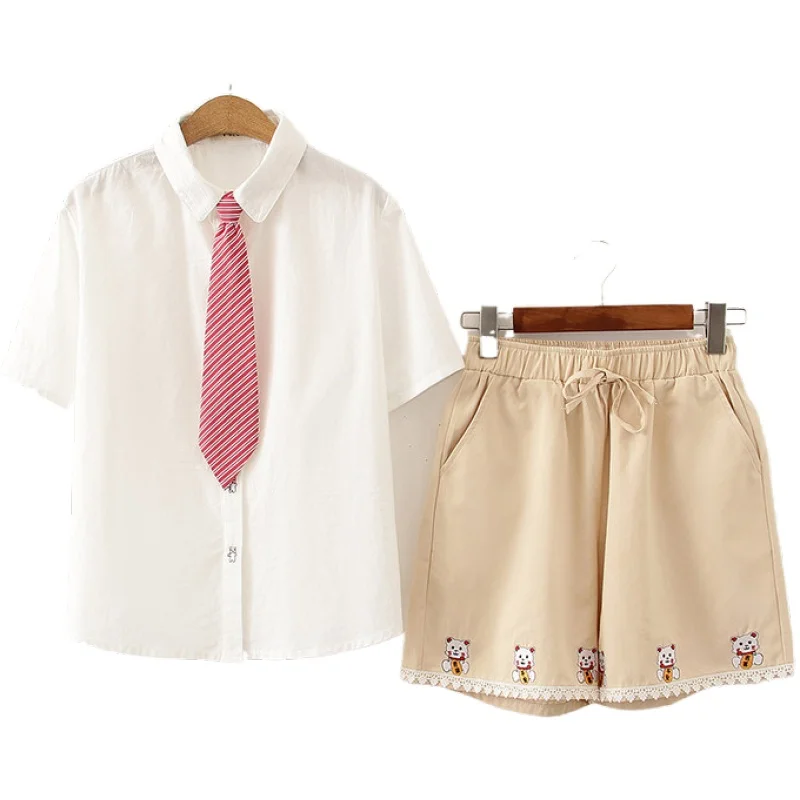 

Women Summer Sets White Short Sleeve Turndown Collar Tie Blouse And Hight Waist Cartoon Embroidery Hot Mini Shotes 2 Piece Set