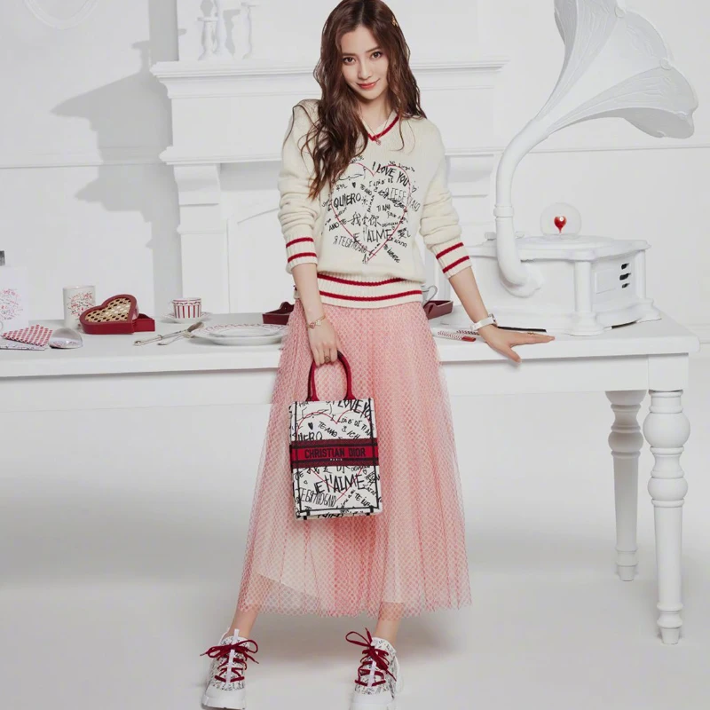 

2020 Autumn New Style Striped Elastic Sexy V-Neck Long-Sleeved Sweater Tulle Polka Dot Half Skirt Women'S Two-Piece High Quality