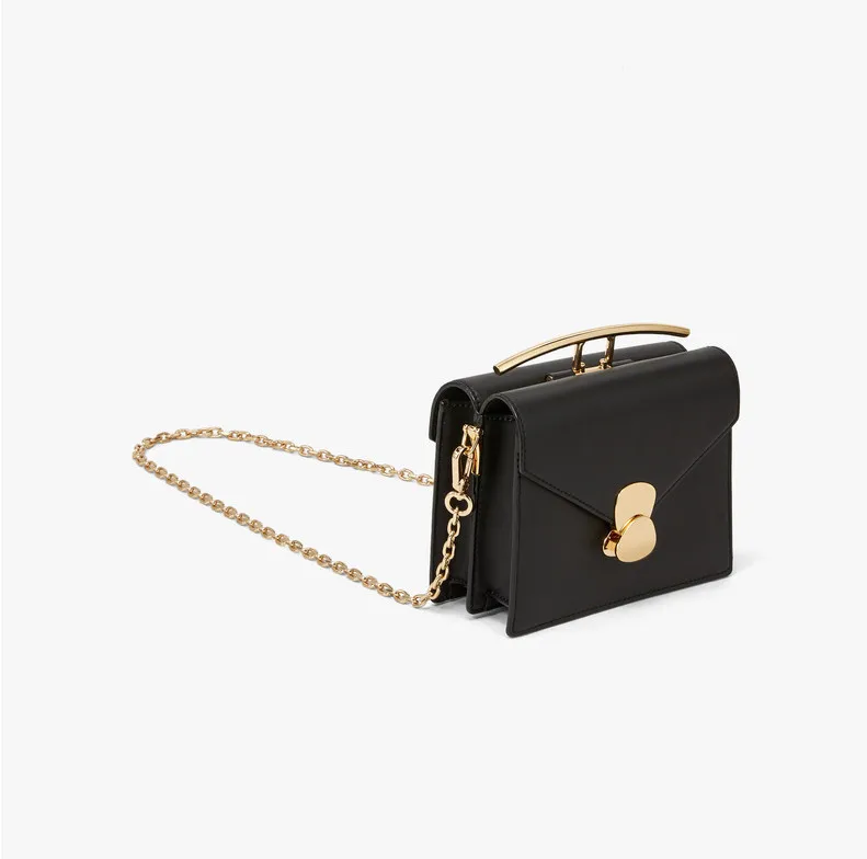 Женская сумка клатч с металлическими ручками роскошная переносная на плечо