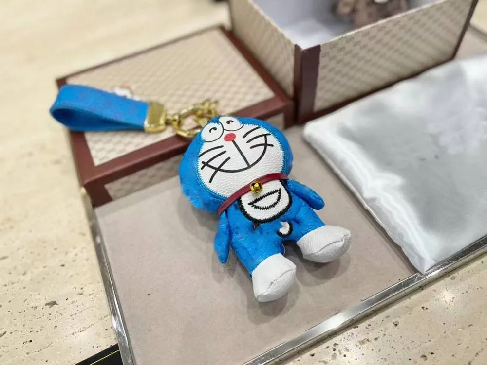 

Luxury Brand Cute cartoon doraemon Keychain Acrylic Colorful Christmas Gift Keychains Car Keys Ring Decoration Accessories