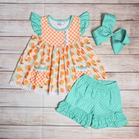 summer girls clothes orange plaid sleeveless skirt and green shorts green leaf orange peach print pattern toddler girl outfits