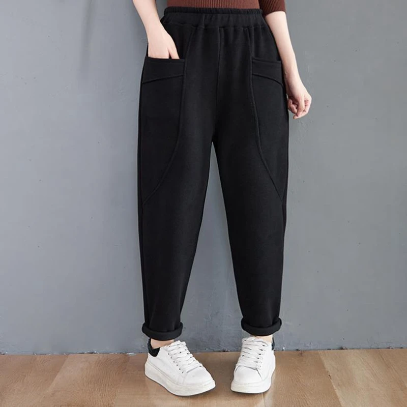 

Autumn and winter Plush and thickened solid Harem Pants Large women's elastic waist casual Big leg warm radish pants