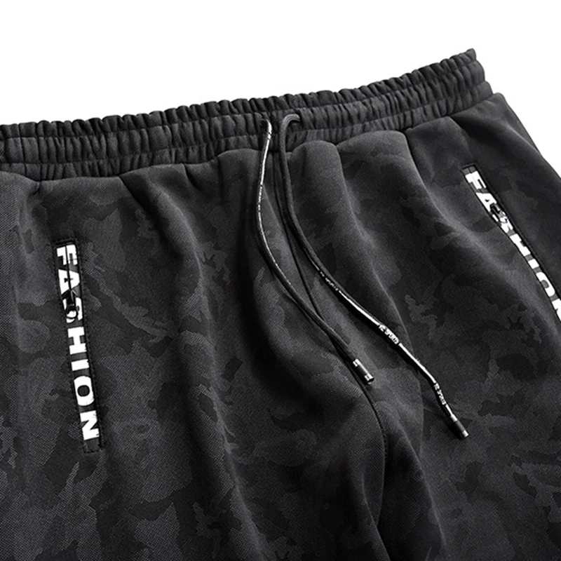 Брюки мужские спортивные с надписью камуфляжные эластичные Стрейчевые штаны на