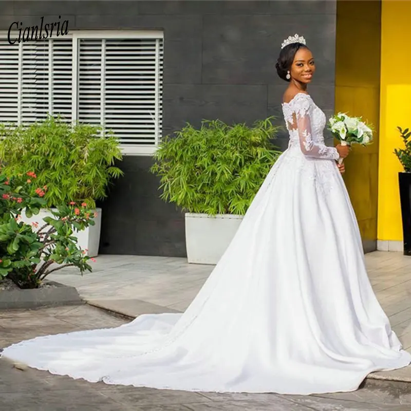 

Очаровательное свадебное платье с открытыми плечами и длинными рукавами 2020 кружевное платье с аппликацией и вырезом лодочкой длинное свад...