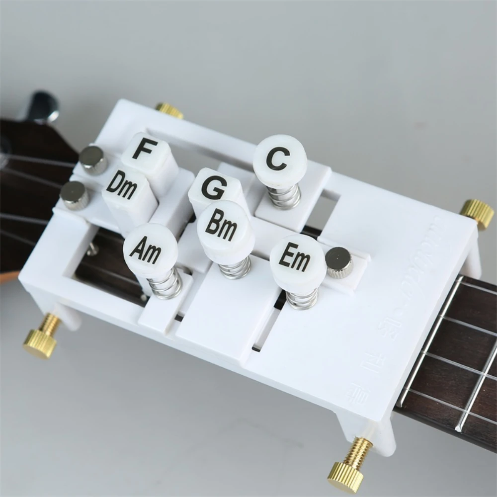 

Ukulele Auxiliary Assist Tool Automatic chord Small Guitar One-Key Chord Artifact Lazy Spin Aid Buttons New