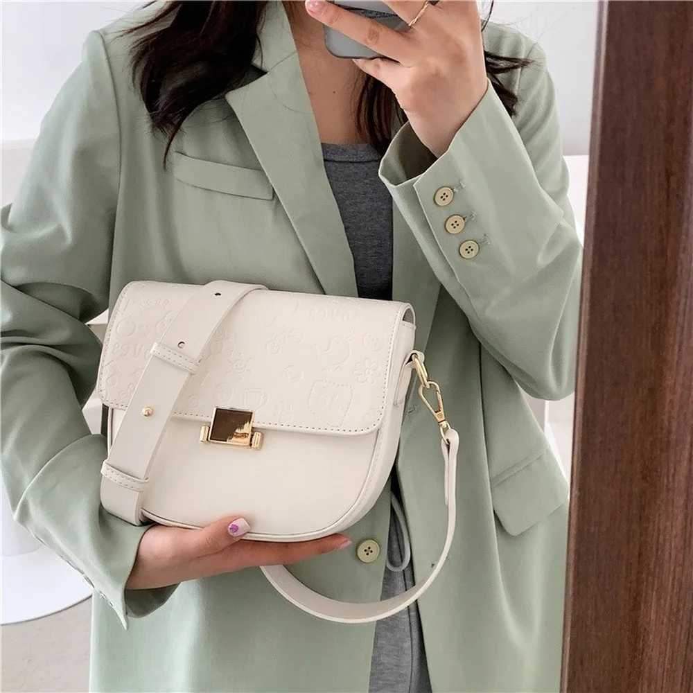 

2021 new solid color PU leather women's shoulder bag retro semicircular saddle bag simple soft leather shoulder messenger bag