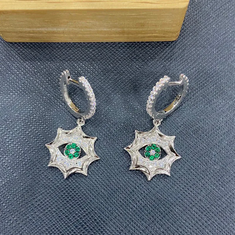 

UMGODLY Модные Серьги серебряного цвета с шипами солнца Украшенные зеленые серьги-кольца от сглаза женские новые Символы ювелирные изделия в п...