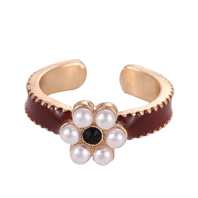 

New temperament and beautiful French pearl ring female ins tide personality creative opening adjustable ring bracelet