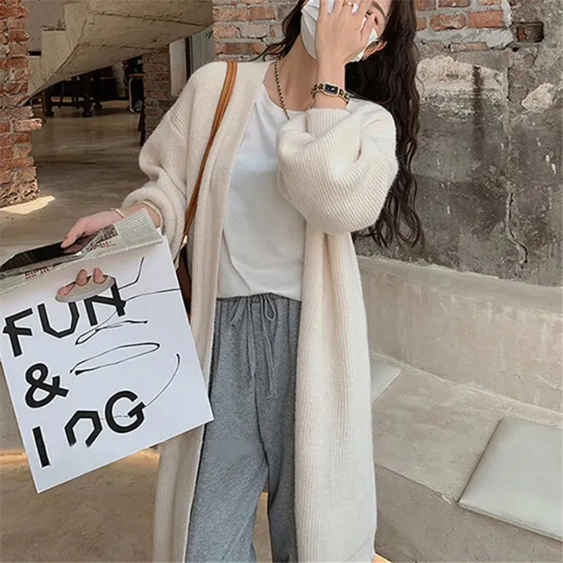

Sweater Women's Spring and Autumn New Solid Color Long-sleeved Cardigan Loose Long Coat Simple Commuter Knitted Top Female ZM347