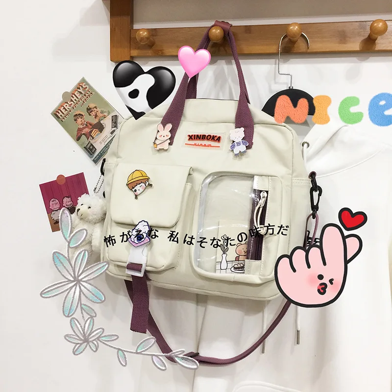 Japanese large-capacity cute bag female Korean version of shoulder messenger bag fashion ins student campus portable book bag