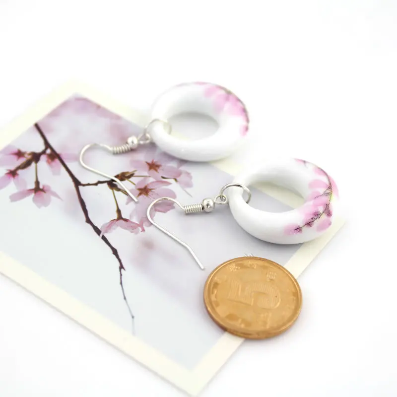 Высококачественные керамические Эффектные серьги капли с цветком высокое