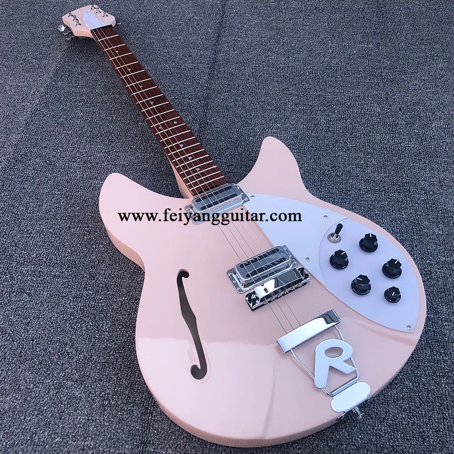 High quality 360 electric guitar with f hole, pink paint and bright fingerboard. Rosewood, Korean pickup, postage
