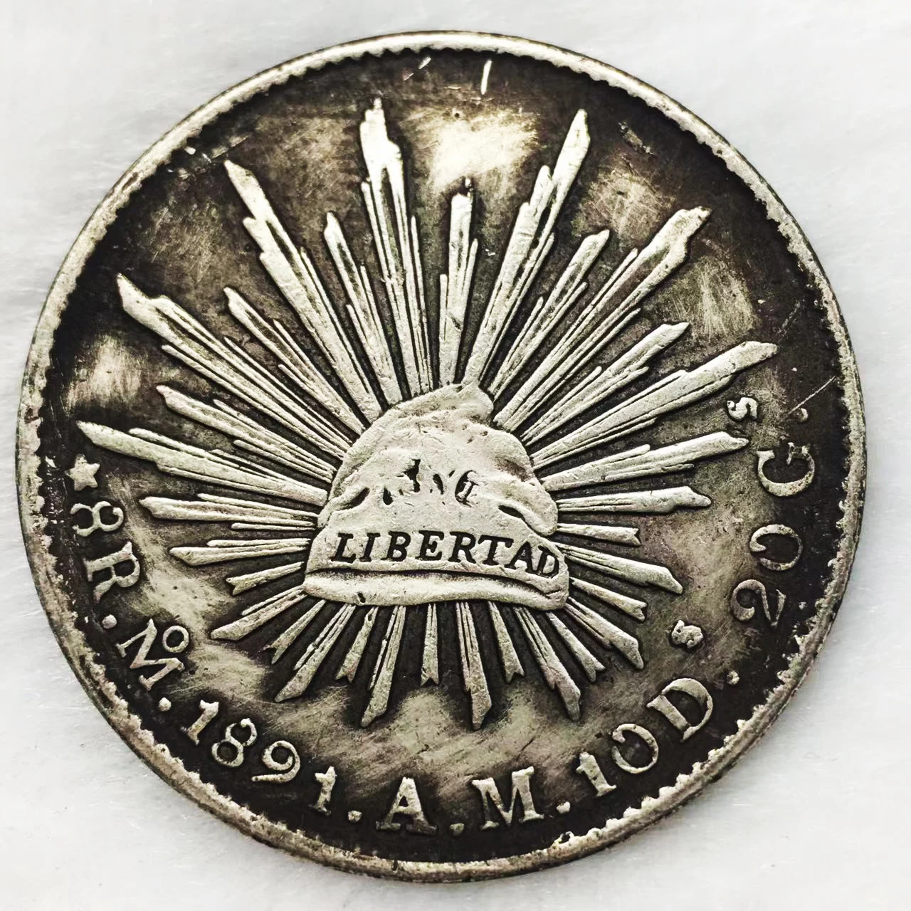 

Серебряная монета Мексики Libertad 1891 года