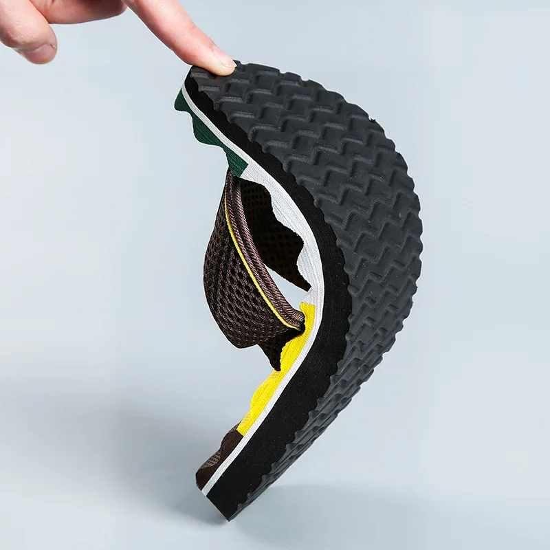 

Men's Flip Flops Men's Contrast Color Massage Rubber Bottom Ribbon Non-Slip Durable Flip-Flops Wholesale