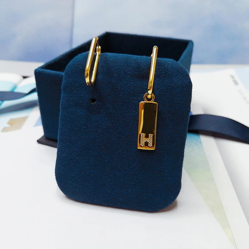 

Asymmetric letter Earrings 925 silver micro inlaid zircon exquisite personality, fashionable, elegant and high-end women's