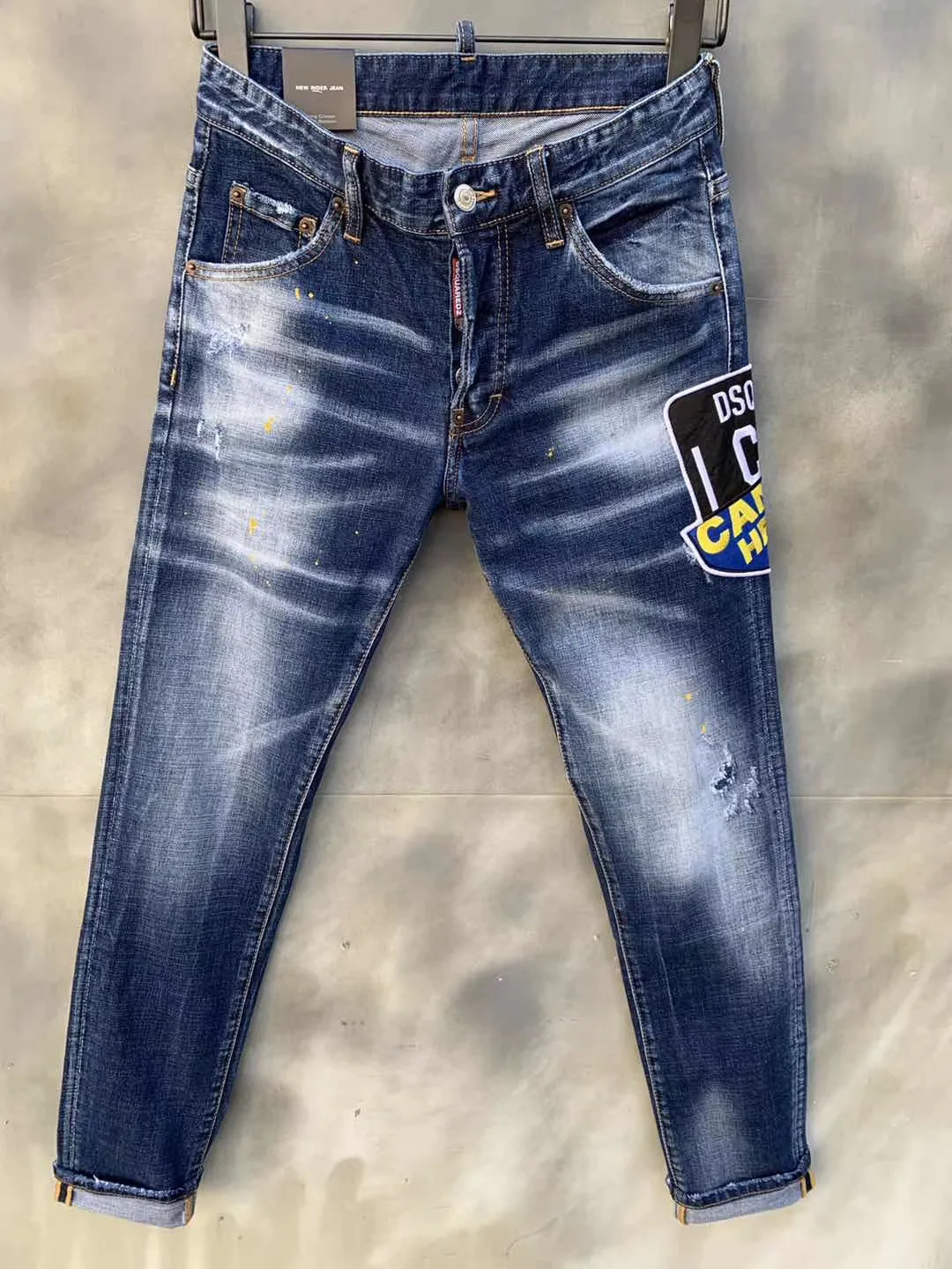 

DSQUARED2 Men's Skinny Jeans Ripped Holes And elastic Paint Spray Blue Stitching Beggar Pants
