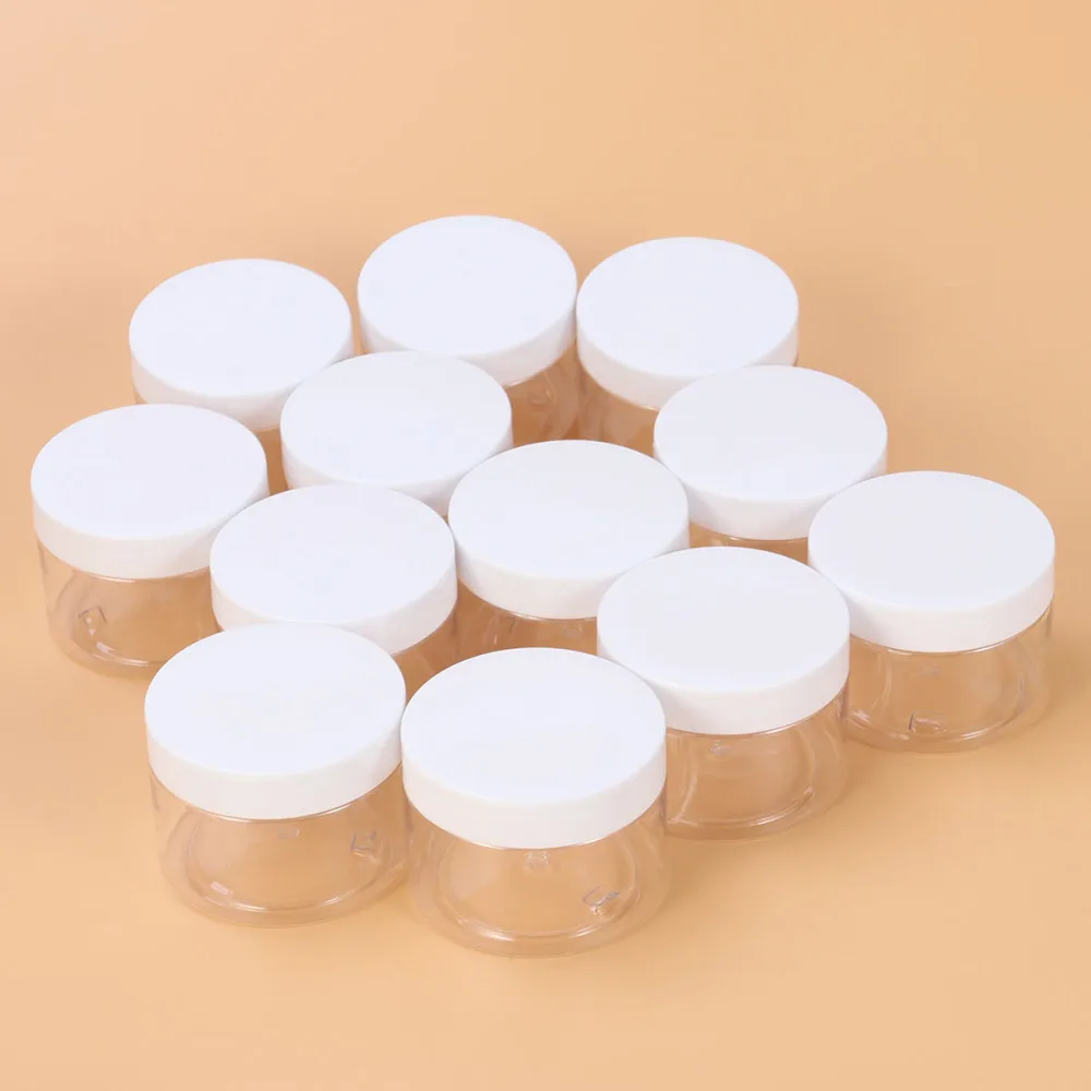 

12 Pcs Empty Clear Clay Storage Favor Jars Wide-mouth Refillable Containers with Lids for Crafts Cosmetics Lotio