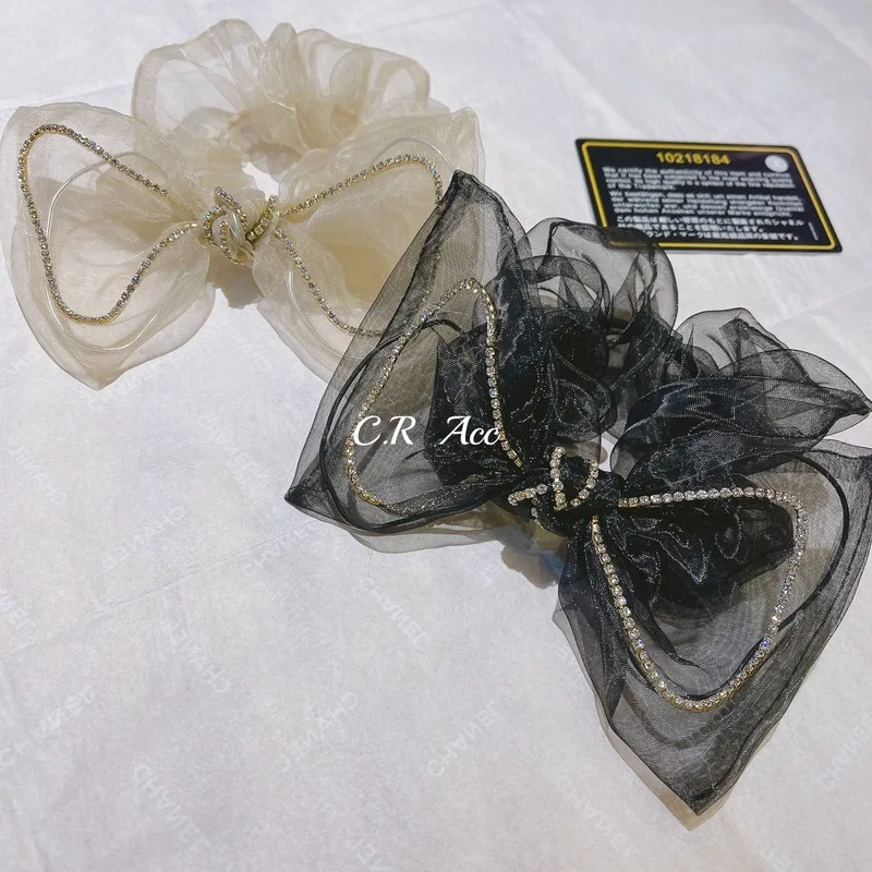 

South Korea's new organza transparent bow bow large intestine hair ring 2021 net red meatball ponytail tie head rope temperament