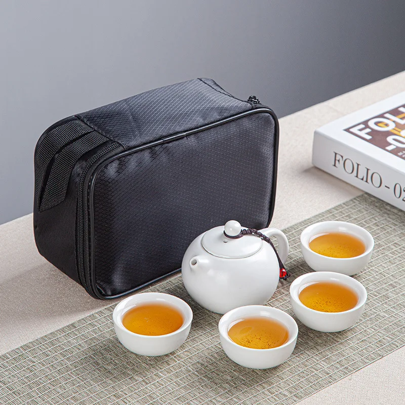 

Travel Tea Set Set Ceramic Ding Kiln One Pot Four Cups Complete Set Portable Tea Set Express Cup Business Gift Customization