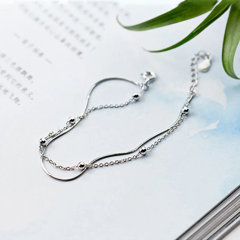 Женский браслет из серебра 925 пробы с двумя круглыми бусинами | Украшения и