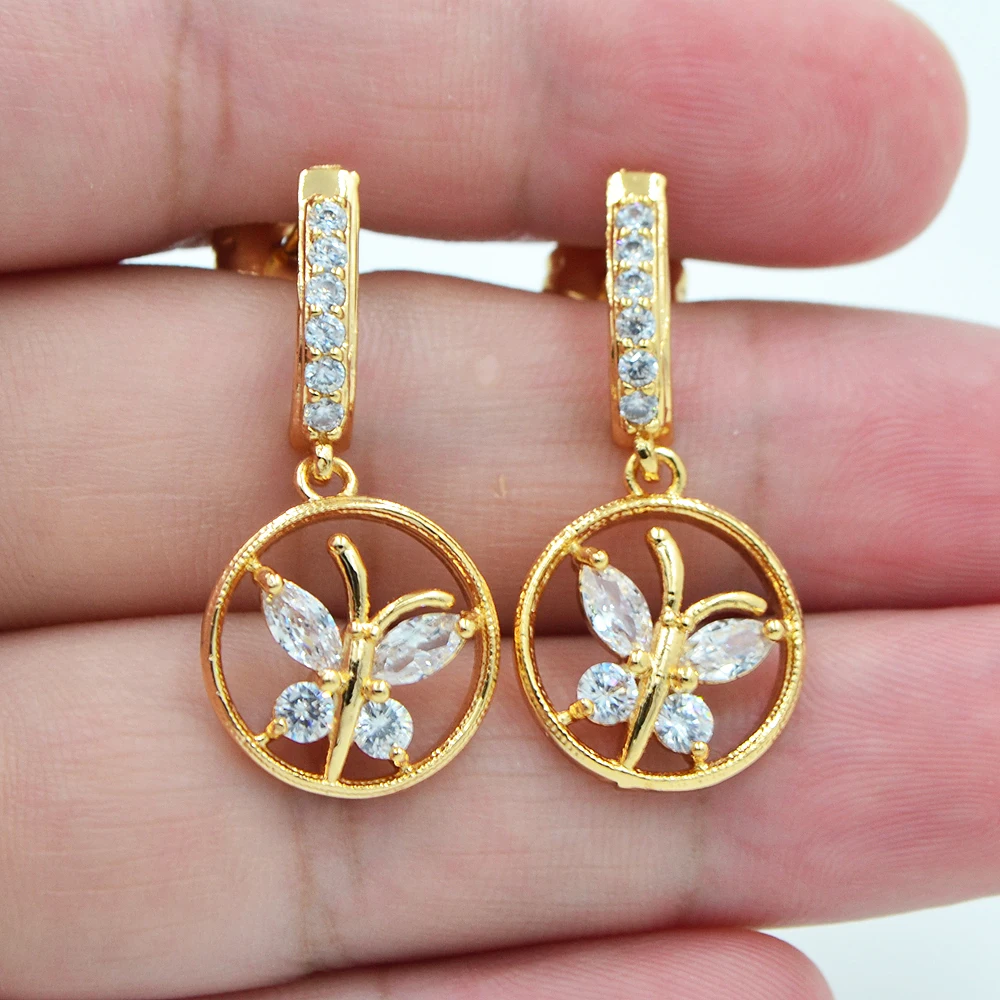 Женские серьги-гвоздики с фианитами золотого цвета | Украшения и аксессуары