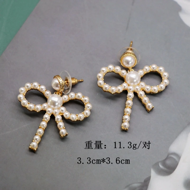 

Hollow Bowknot Silver Needle Earrings Imitated Small Pearl Elegant Bow Earrings For Women