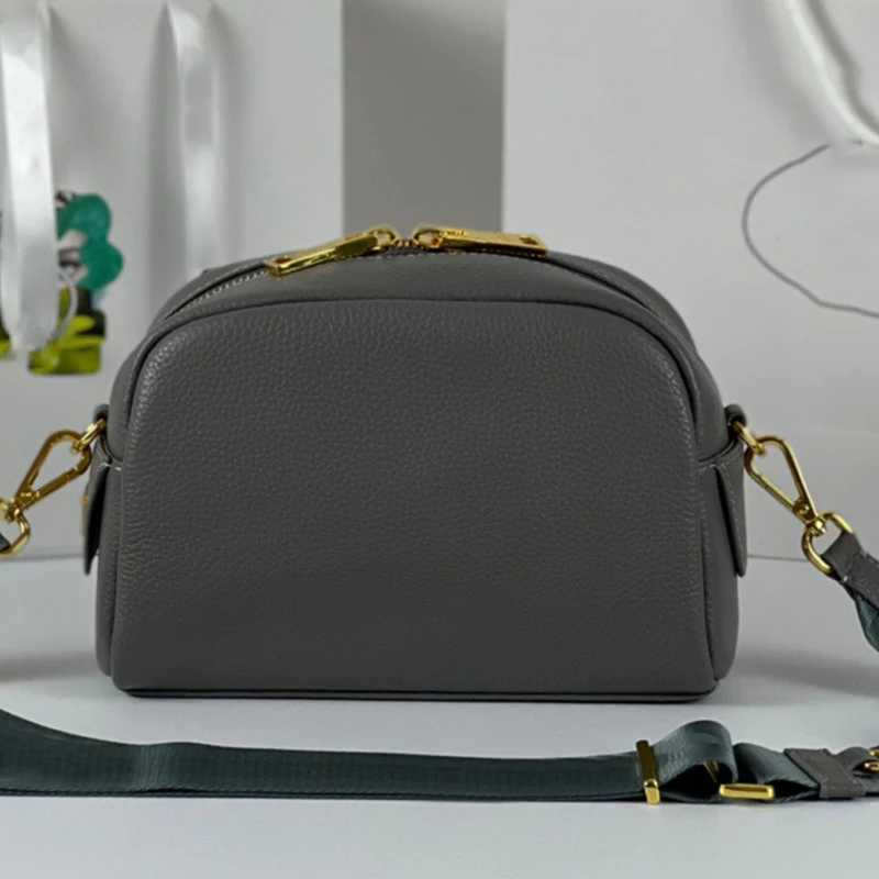 

New design, simple atmosphere, large capacity camera bag, two-way zipper, classic oval shape, diagonal bag, shoulder bag