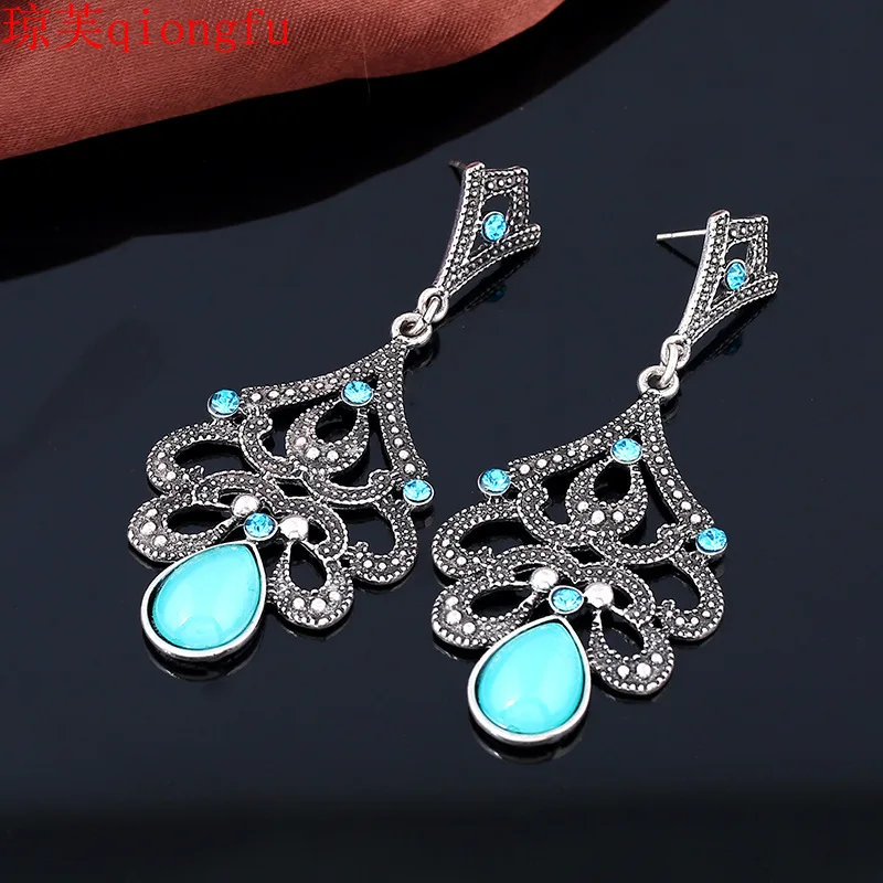 

Lucky Bohemian European and American Retro Diamond Hollow Water Drop Opal Earrings Female Stud Earrings