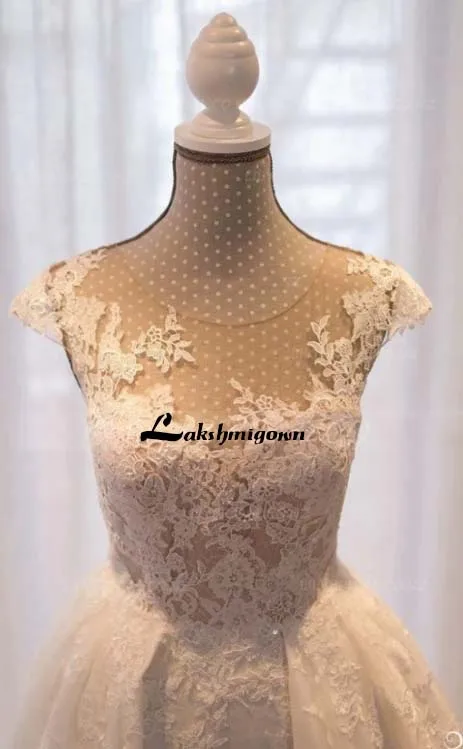 Lace Illusion Bridal Wedding Dress With Overskirt Lace Appliques Court Train Jewel Neck Cap Sleeve Wedding Bridal Gowns