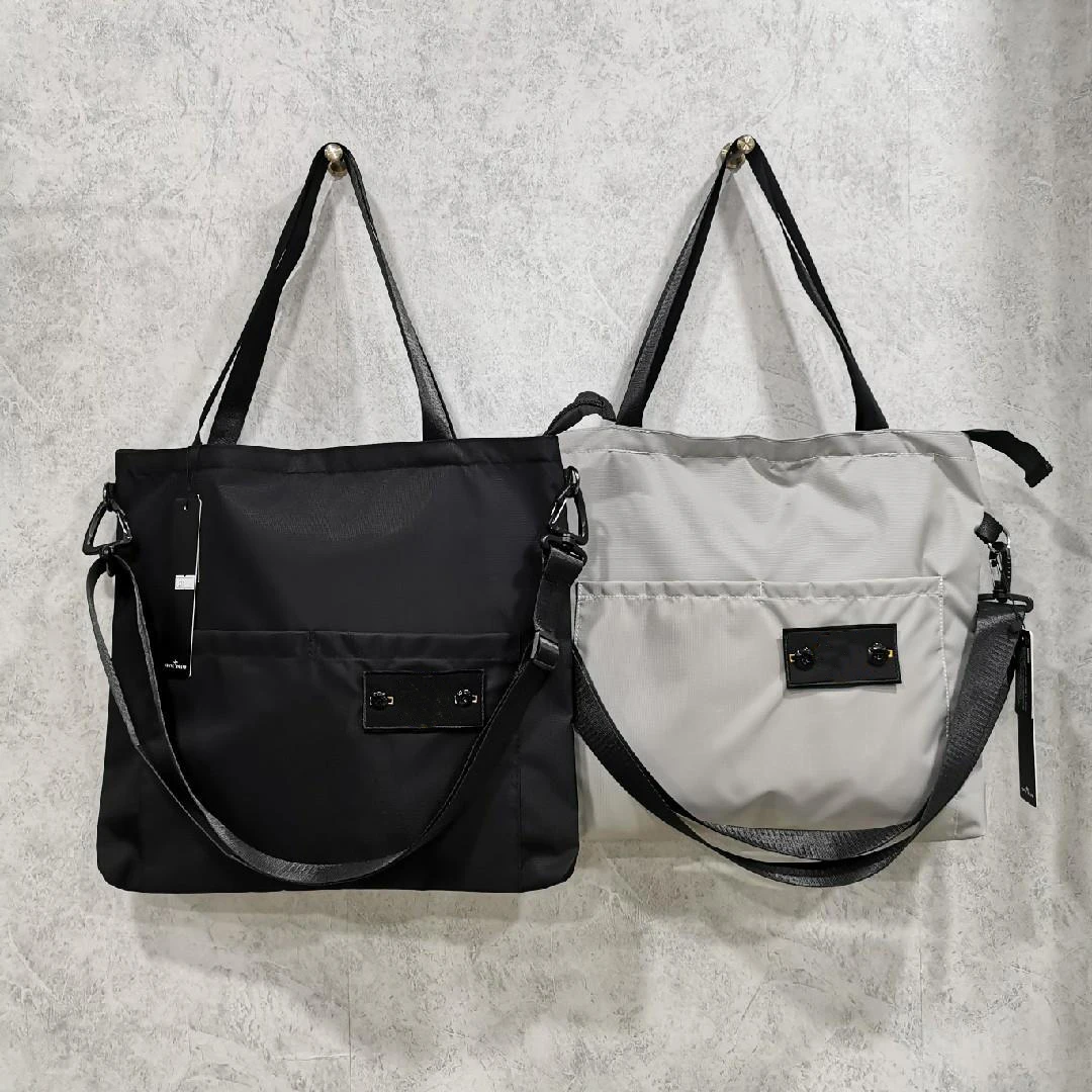 

2021 new luxury stone messenger bag large capacity functional wind single shoulder handbag men and women travel bag