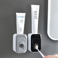 automatic toothpaste dispenser wall mounted stand home dust proof toothpaste lazy dispenser bathroom accessories set squeezer