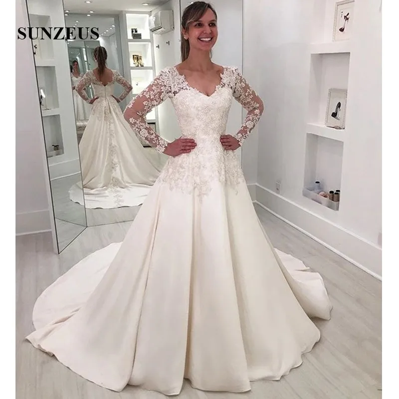 

Открытой спиной платье цвета слоновой кости атласные свадебные платья в форме трапеции с длинными рукавами и v-образным вырезом Eleagnt загоро...