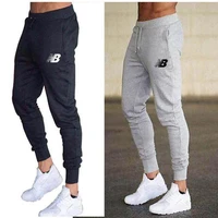 new male korean version of quick drying pants mens casual pants fitness pants running sports trousers mens slim feet pants
